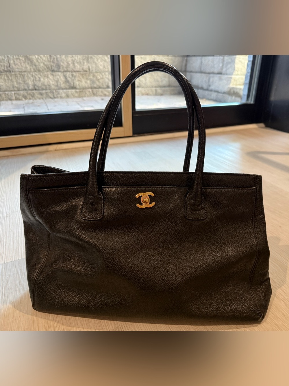 Authentic CHANEL Black Executive Cerf Tote with Gold CC Emblem